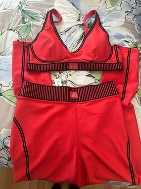 Alo Reddish Orange Striped Elastic Sports Bra and Leggings Set